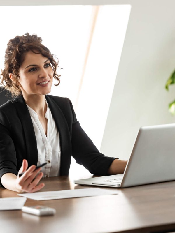 smiling-consultant-talking-to-a-client-on-a-business-meeting-portrait-.jpg